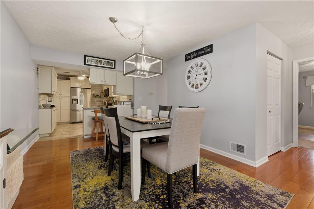106 Pony Drive Freedom, PA 15042 - Photo 8 of 30 The Living Room Flows Into The Dining Room ~ Perfect For Entertaining