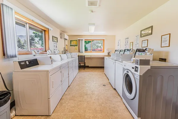 a view of living room with washer and dryer
