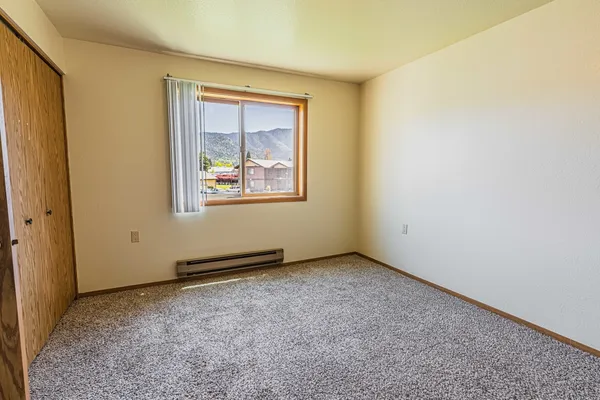 an empty room with windows