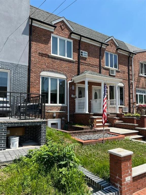 83 Gravesend Neck Road Brooklyn, NY 11223 - Photo 1 of 27 a front view of a house with garden and plants