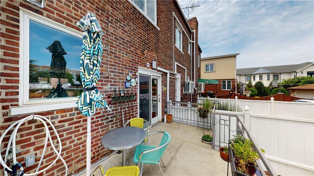 83 Gravesend Neck Road Brooklyn, NY 11223 - Photo 21 of 27 a view of a chairs and table in patio