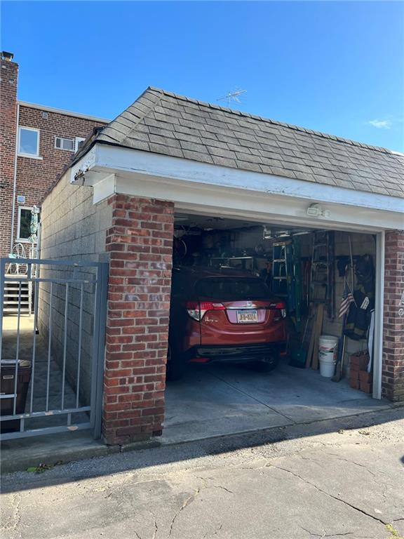 83 Gravesend Neck Road Brooklyn, NY 11223 - Photo 10 of 27 a front view of a building with parking space