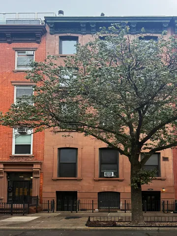 a view of a chairs and table in a patio