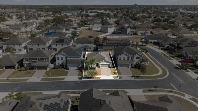 an aerial view of multiple house