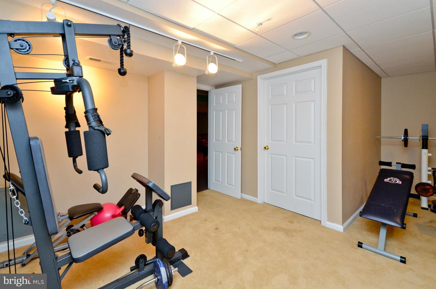 14901 Ridge Farm Court Bowie, MD 20715 - Photo 24 of 28 Basement Gym