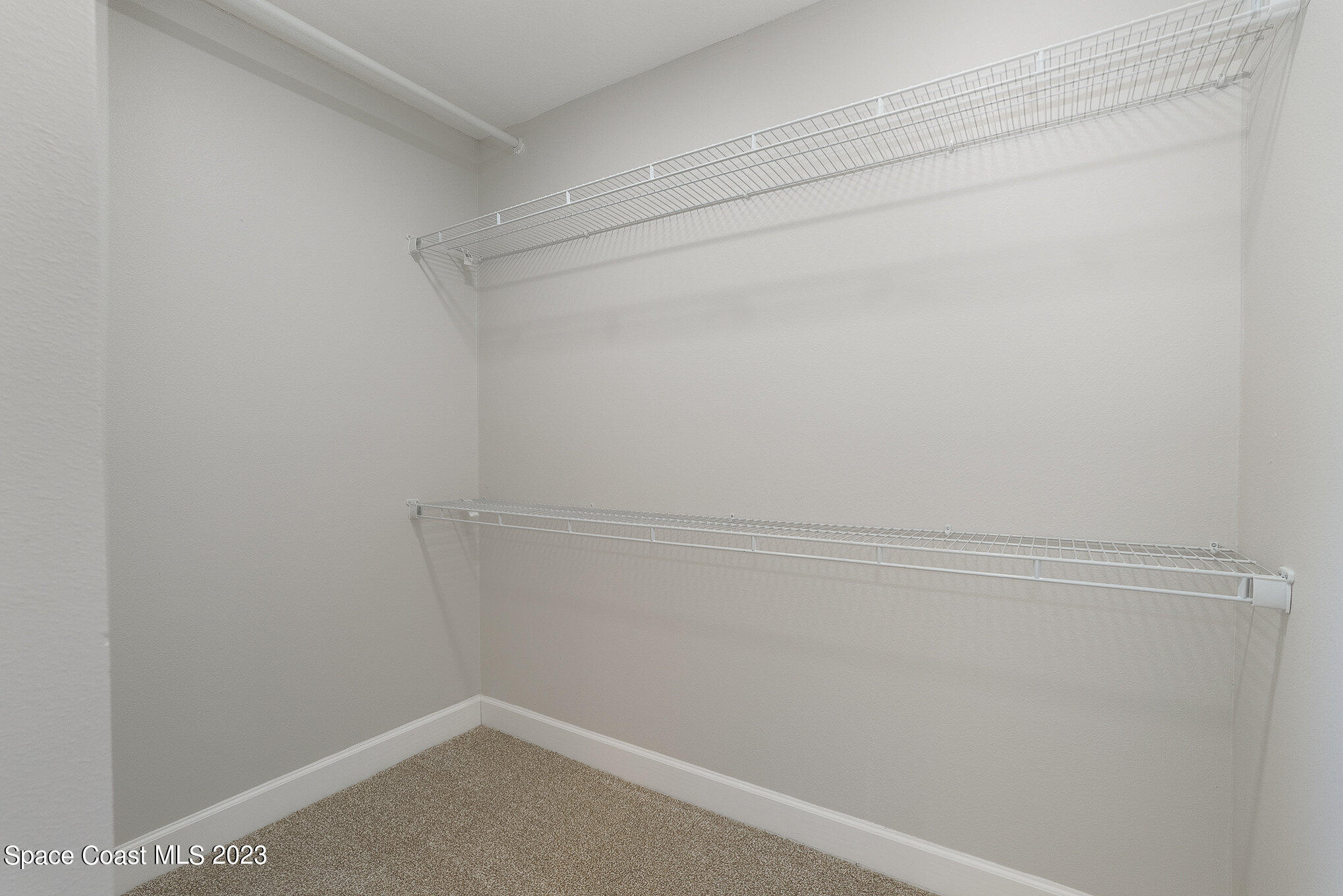 1339 Forest Drive Rockledge, FL 32955 - Photo 20 of 21 a view of a room with racks on the wall