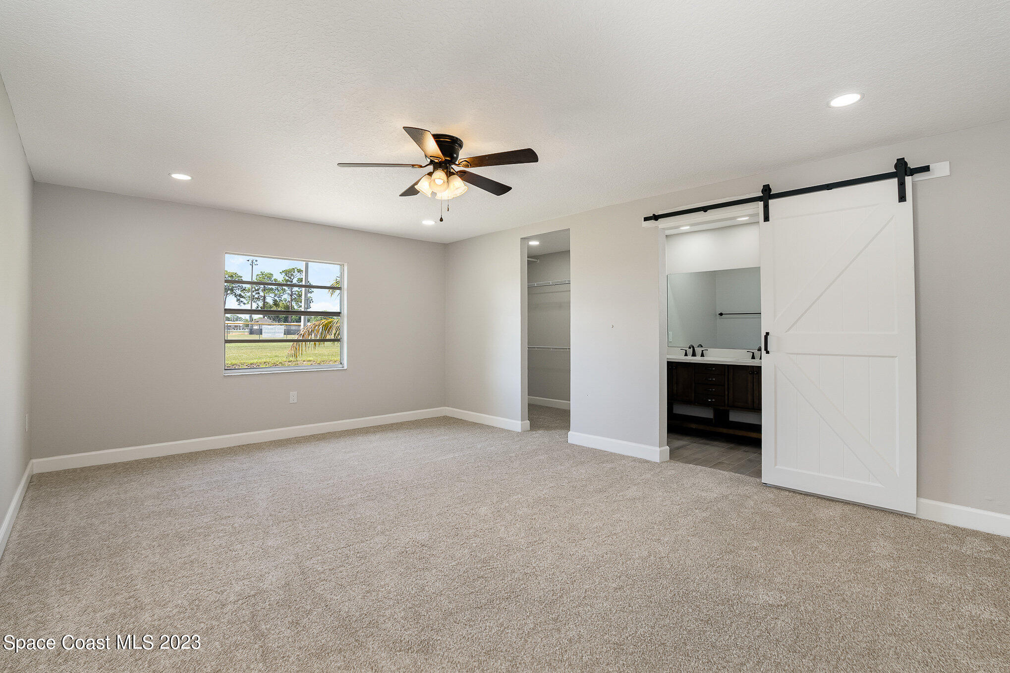 1339 Forest Drive Rockledge, FL 32955 - Photo 10 of 21 a view of an empty room with a window