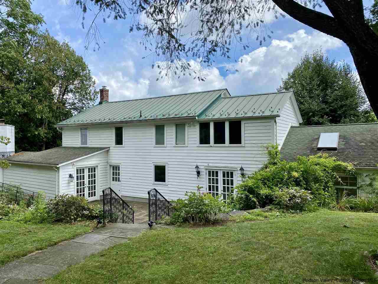 3572 Main Street Stone Ridge, NY 12484 - Photo 2 of 35 a front view of a house with a yard