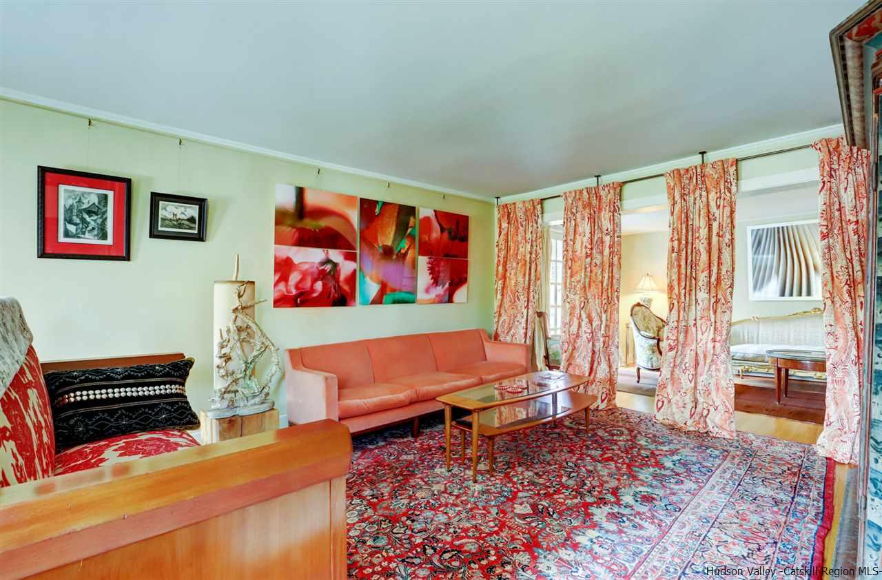 3572 Main Street Stone Ridge, NY 12484 - Photo 13 of 35 a living room with furniture and a rug