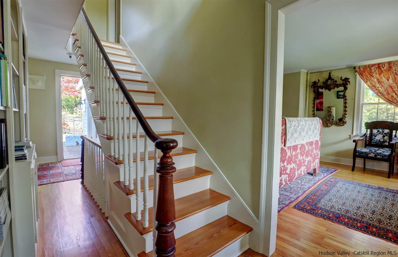 3572 Main Street Stone Ridge, NY 12484 - Photo 15 of 35 a view of entryway livingroom and hall with wooden floor