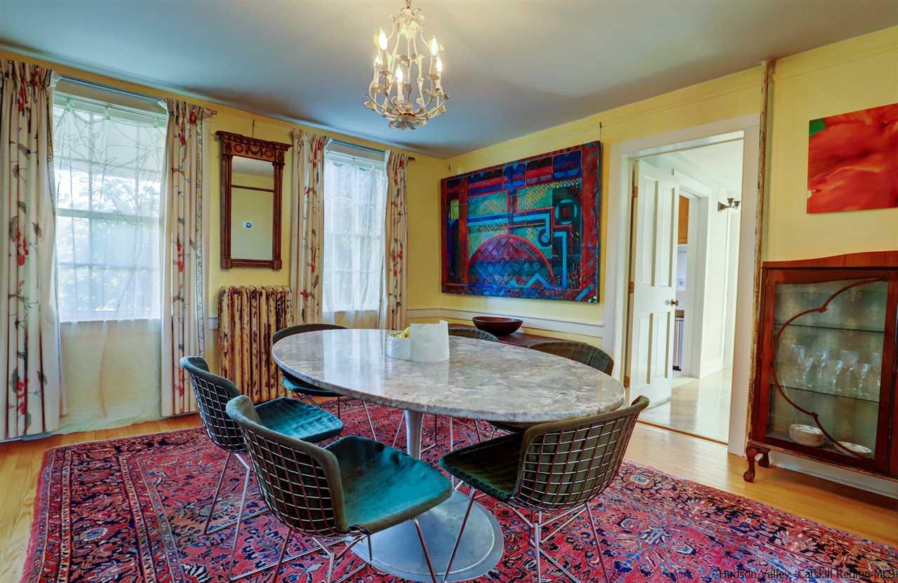 3572 Main Street Stone Ridge, NY 12484 - Photo 17 of 35 a living room with furniture and a flat screen tv
