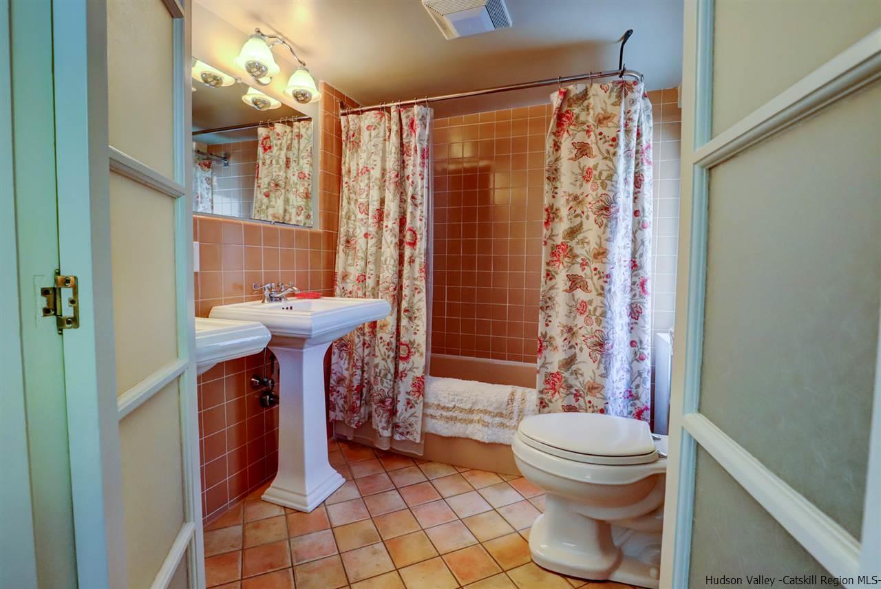 3572 Main Street Stone Ridge, NY 12484 - Photo 24 of 35 a bathroom with a sink toilet and shower