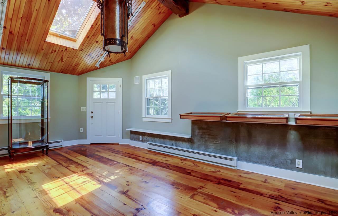 3572 Main Street Stone Ridge, NY 12484 - Photo 26 of 35 a living room with a bed