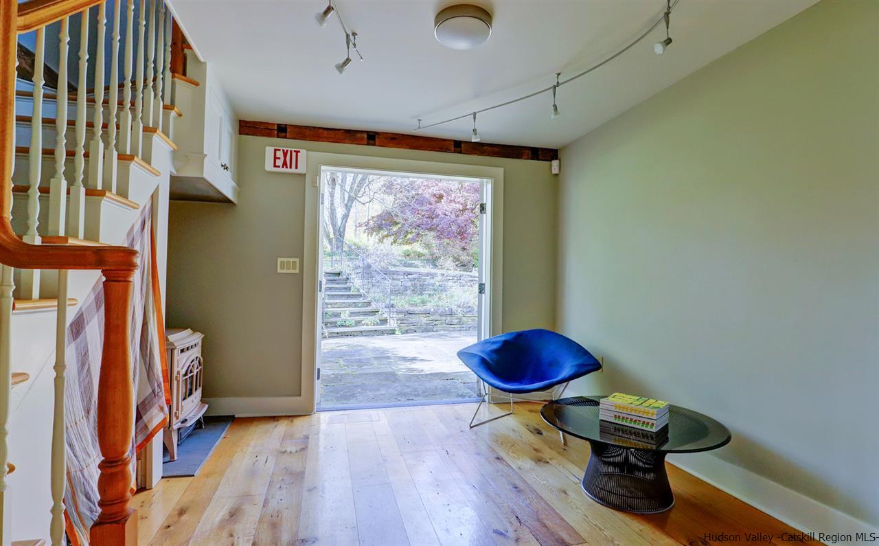 3572 Main Street Stone Ridge, NY 12484 - Photo 28 of 35 a room with furniture and wooden floor