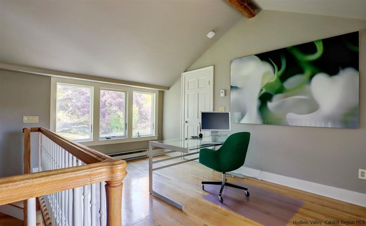 3572 Main Street Stone Ridge, NY 12484 - Photo 30 of 35 a living room with furniture and a potted plant