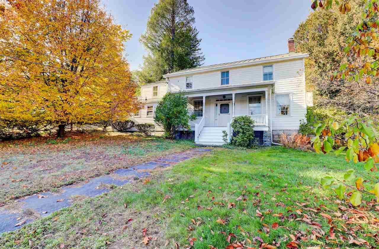 3572 Main Street Stone Ridge, NY 12484 - Photo 34 of 35 a front view of house with yard and trees around