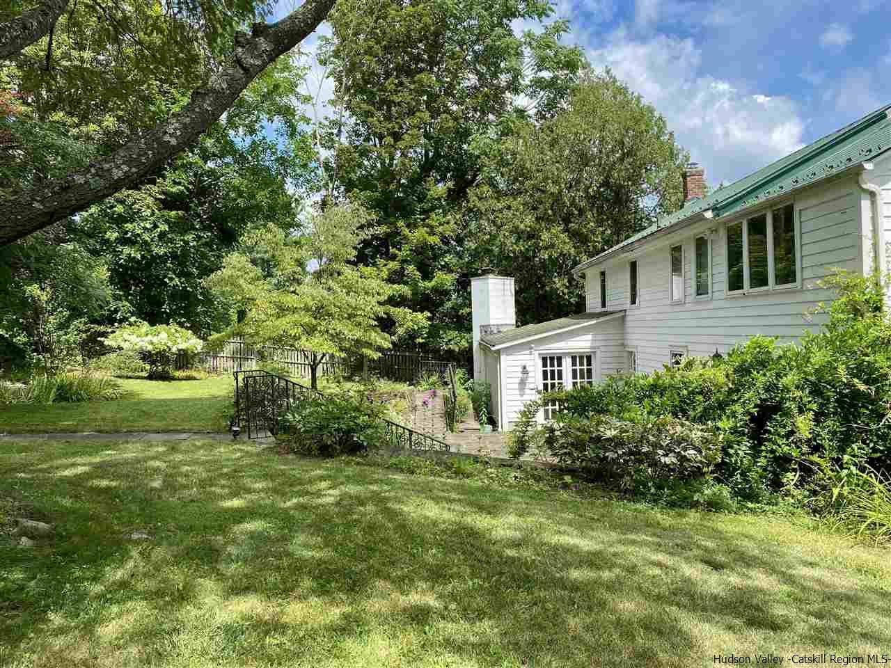 3572 Main Street Stone Ridge, NY 12484 - Photo 5 of 35 a front view of a house with a yard