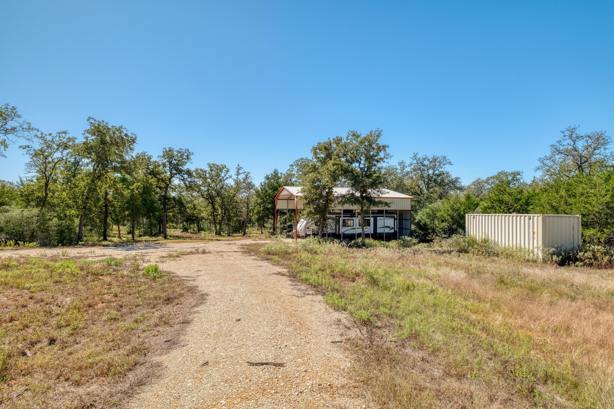 532 Peach Creek Road Rosanky, TX 78953 - Photo 8 of 17 a yellow house with trees in front of it