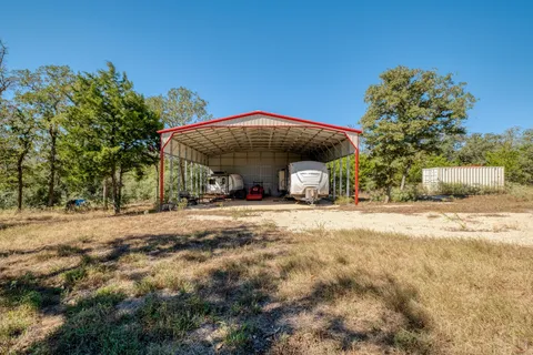 a view of a house with a patio