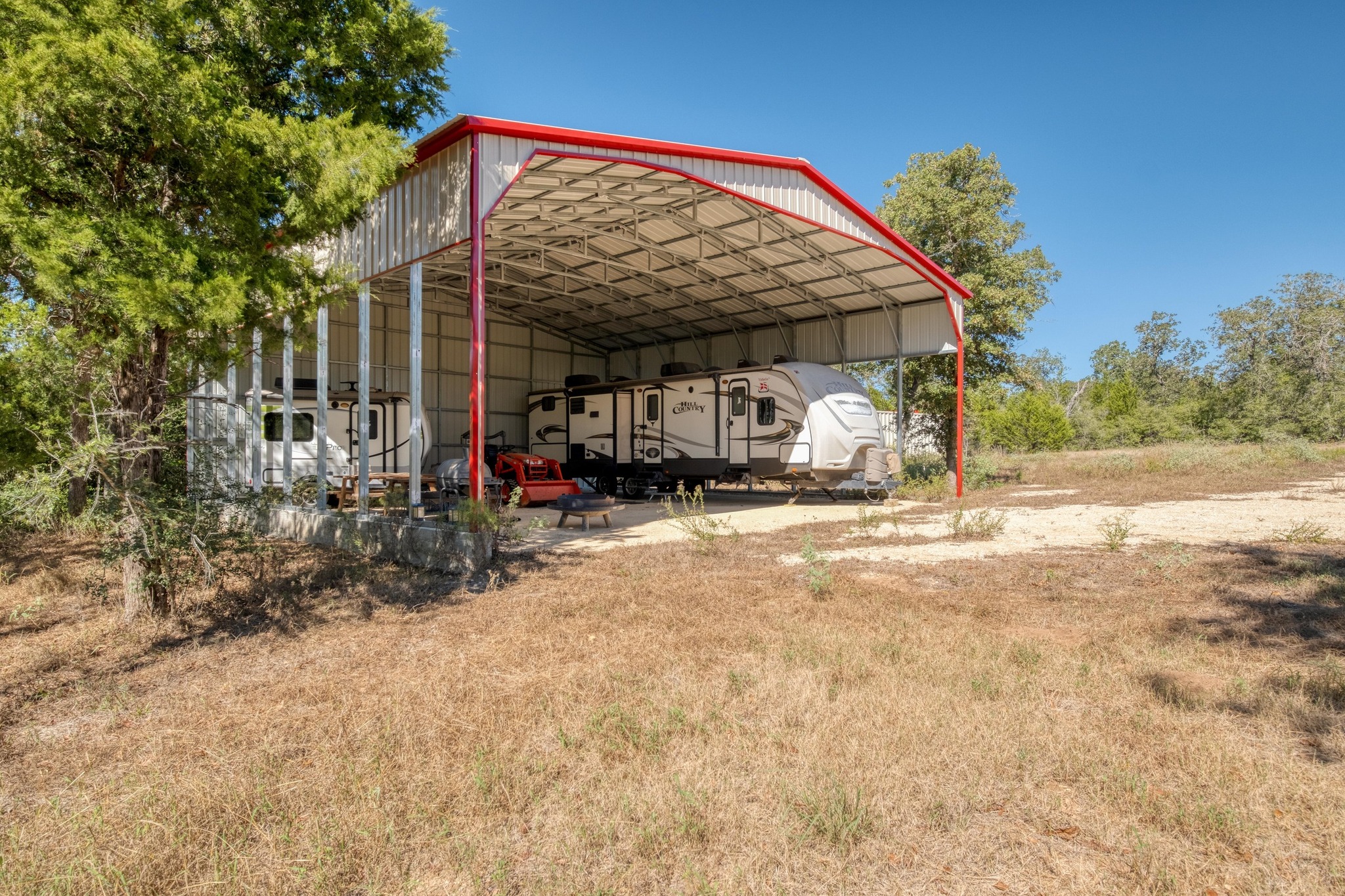 532 Peach Creek Road Rosanky, TX 78953 - Photo 10 of 17 a view of a house with a patio