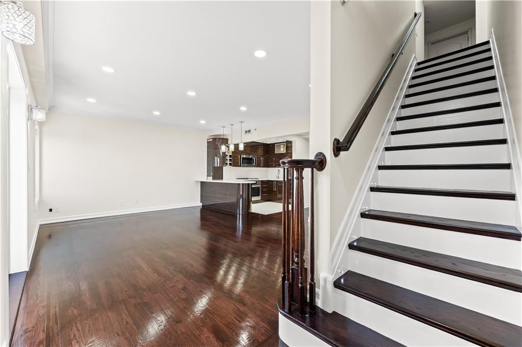 3165 Emmons Avenue, Unit PH3N Brooklyn, NY 11235 - Photo 13 of 33 a view of entryway and hall with wooden floor