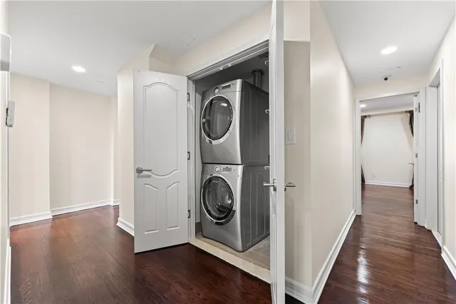 a view of a hallway with washer and dryer