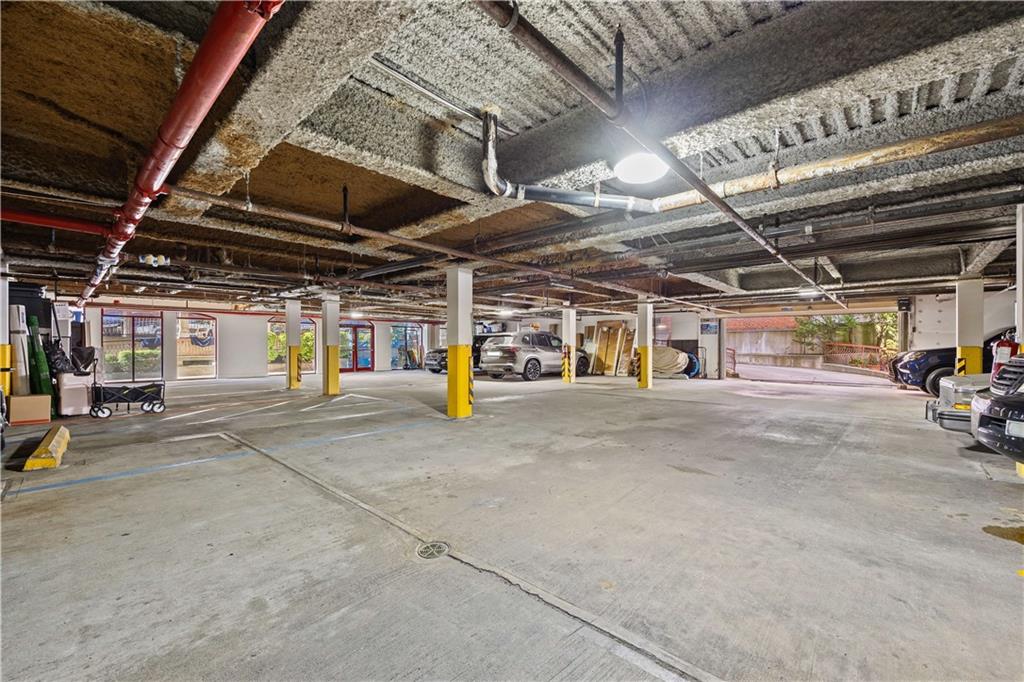 3165 Emmons Avenue, Unit PH3N Brooklyn, NY 11235 - Photo 30 of 33 a view of parking garage with red