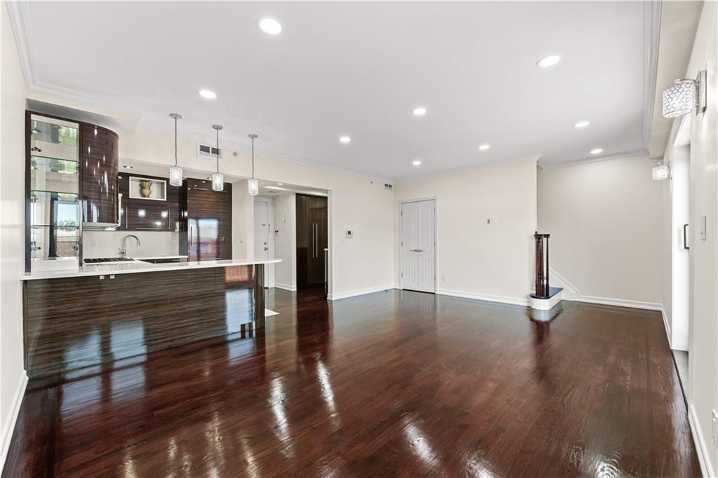 3165 Emmons Avenue, Unit PH3N Brooklyn, NY 11235 - Photo 6 of 33 a view of kitchen with cabinets and wooden floor