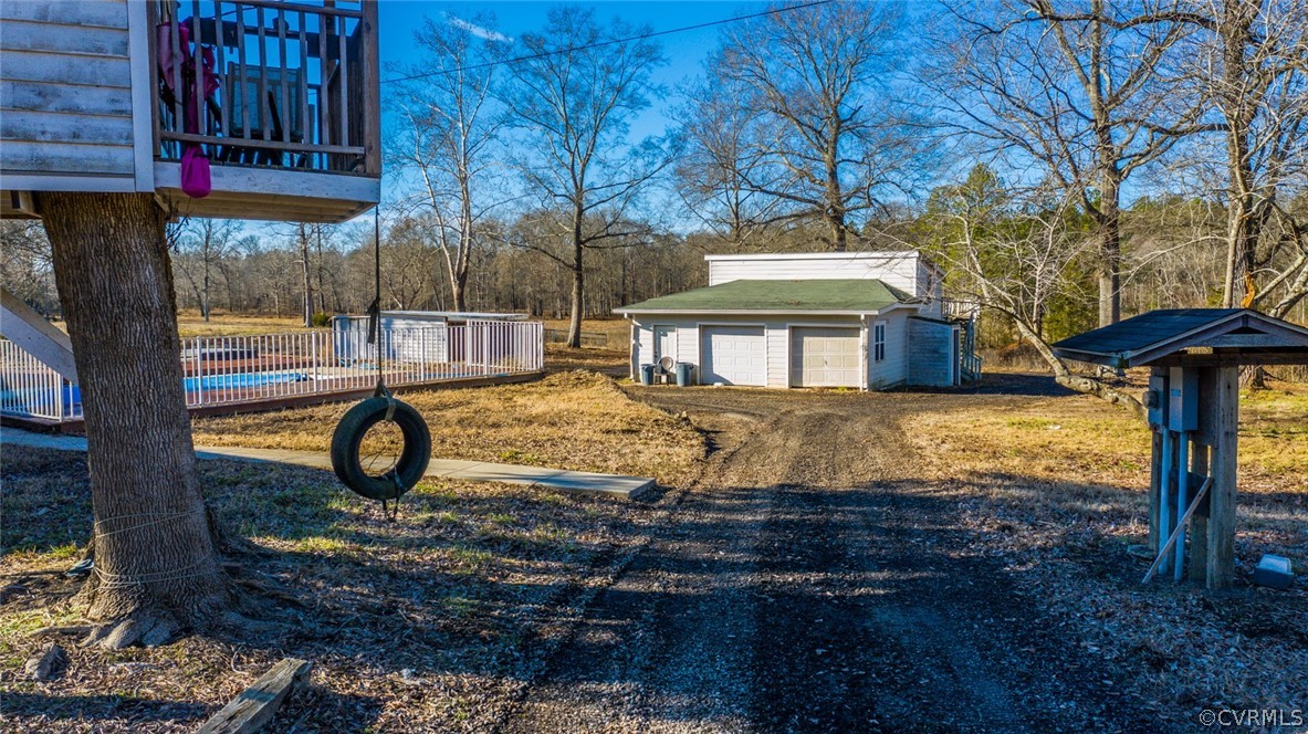 12300 Black Road Chesterfield, VA 23838 - Photo 11 of 50 a front view of a house with yard and trees