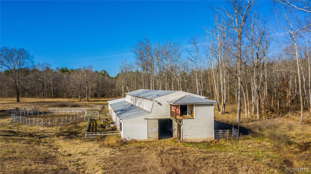 12300 Black Road Chesterfield, VA 23838 - Photo 21 of 50 a view of a white house with a yard and sitting area