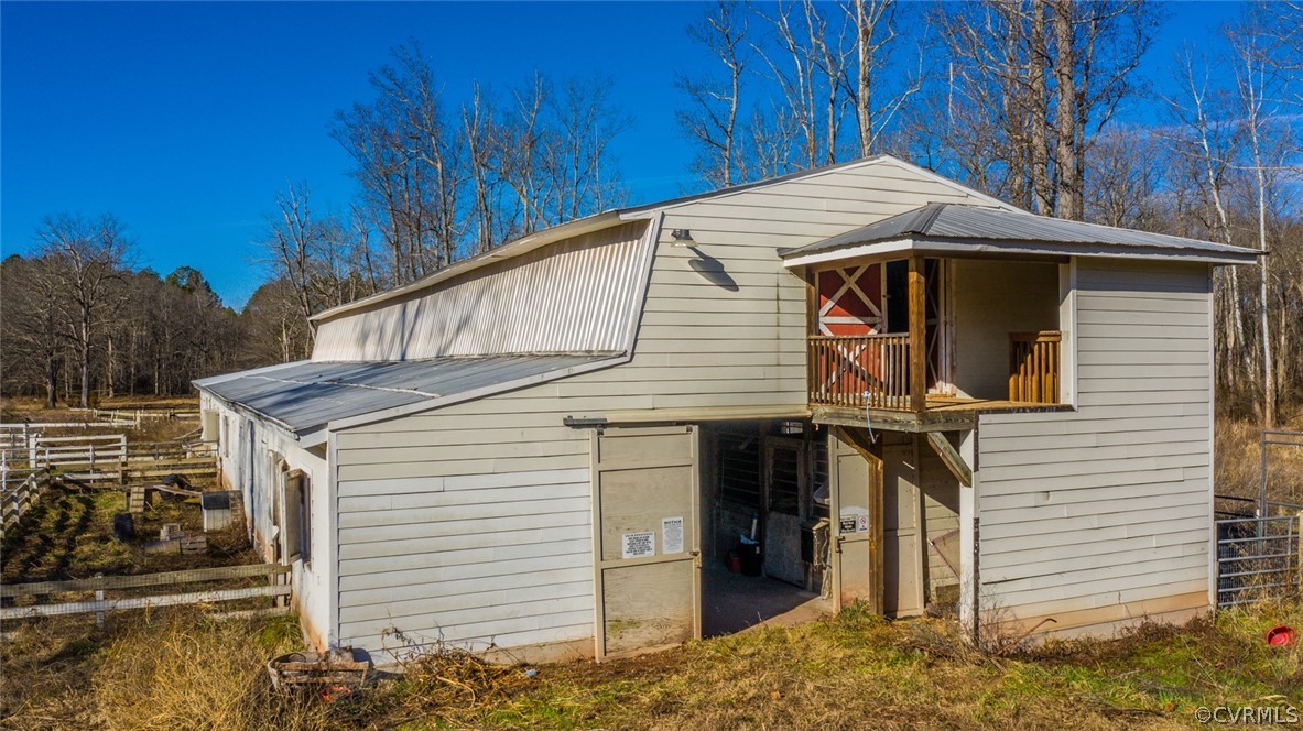 12300 Black Road Chesterfield, VA 23838 - Photo 23 of 50 a front view of a house with garage