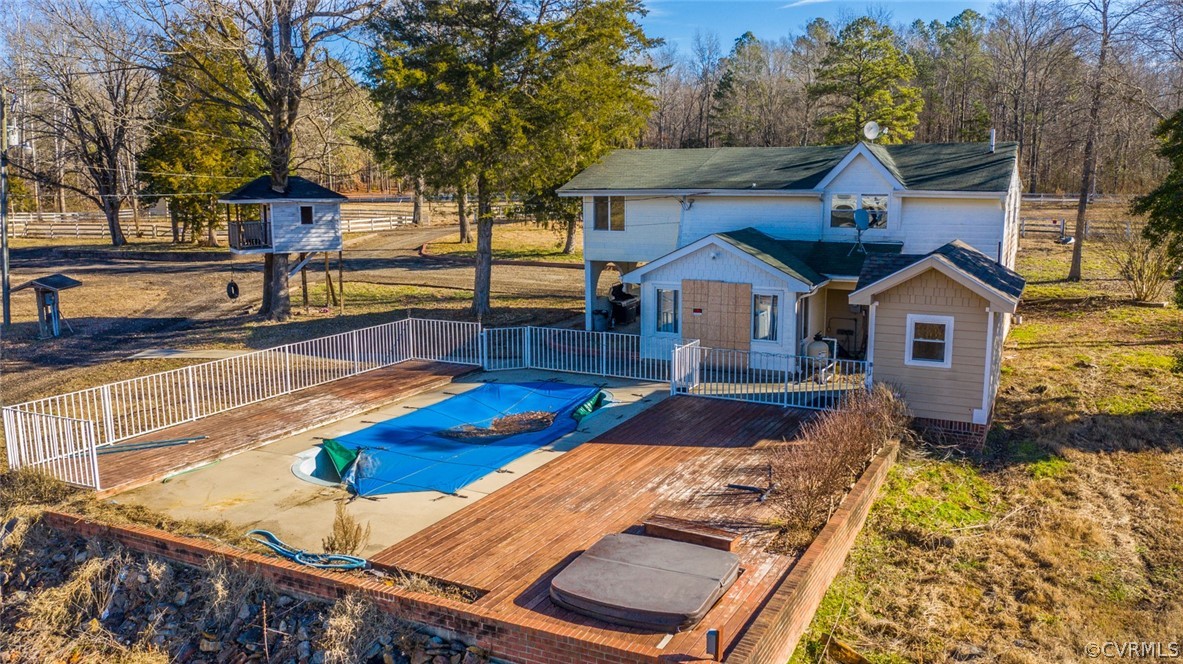 12300 Black Road Chesterfield, VA 23838 - Photo 10 of 50 a front view of house with yard outdoor seating and covered with trees