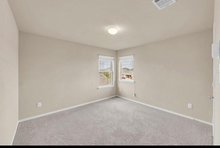 2315 Julia Lane Forney, TX 75126 - Photo 18 of 35 Carpeted spare room with baseboards