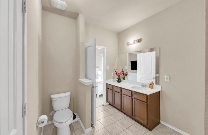 2315 Julia Lane Forney, TX 75126 - Photo 30 of 35 Bathroom with vanity and light tile patterned flooring