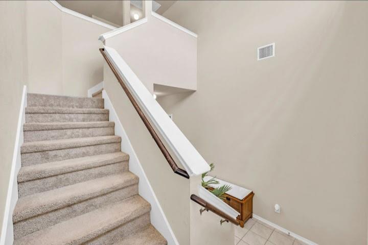 2315 Julia Lane Forney, TX 75126 - Photo 10 of 35 Staircase with baseboards and tile patterned floors