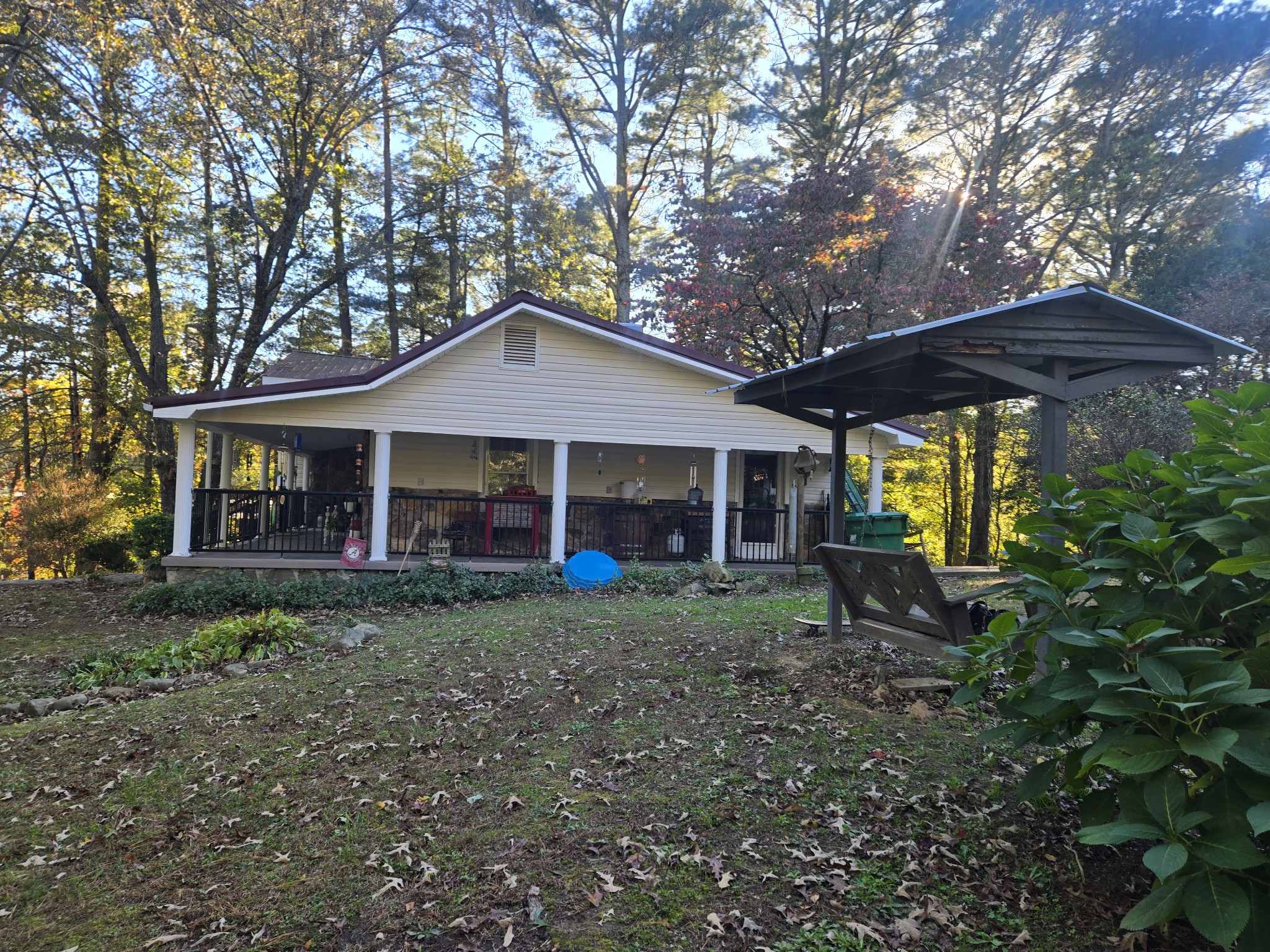 75 Travis Street Tracy City, TN 37387 - Photo 11 of 37 a view of a house with a yard