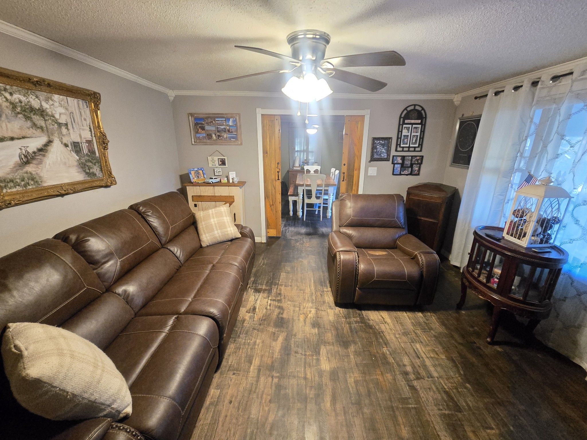 75 Travis Street Tracy City, TN 37387 - Photo 20 of 37 a living room with furniture and a wooden floor