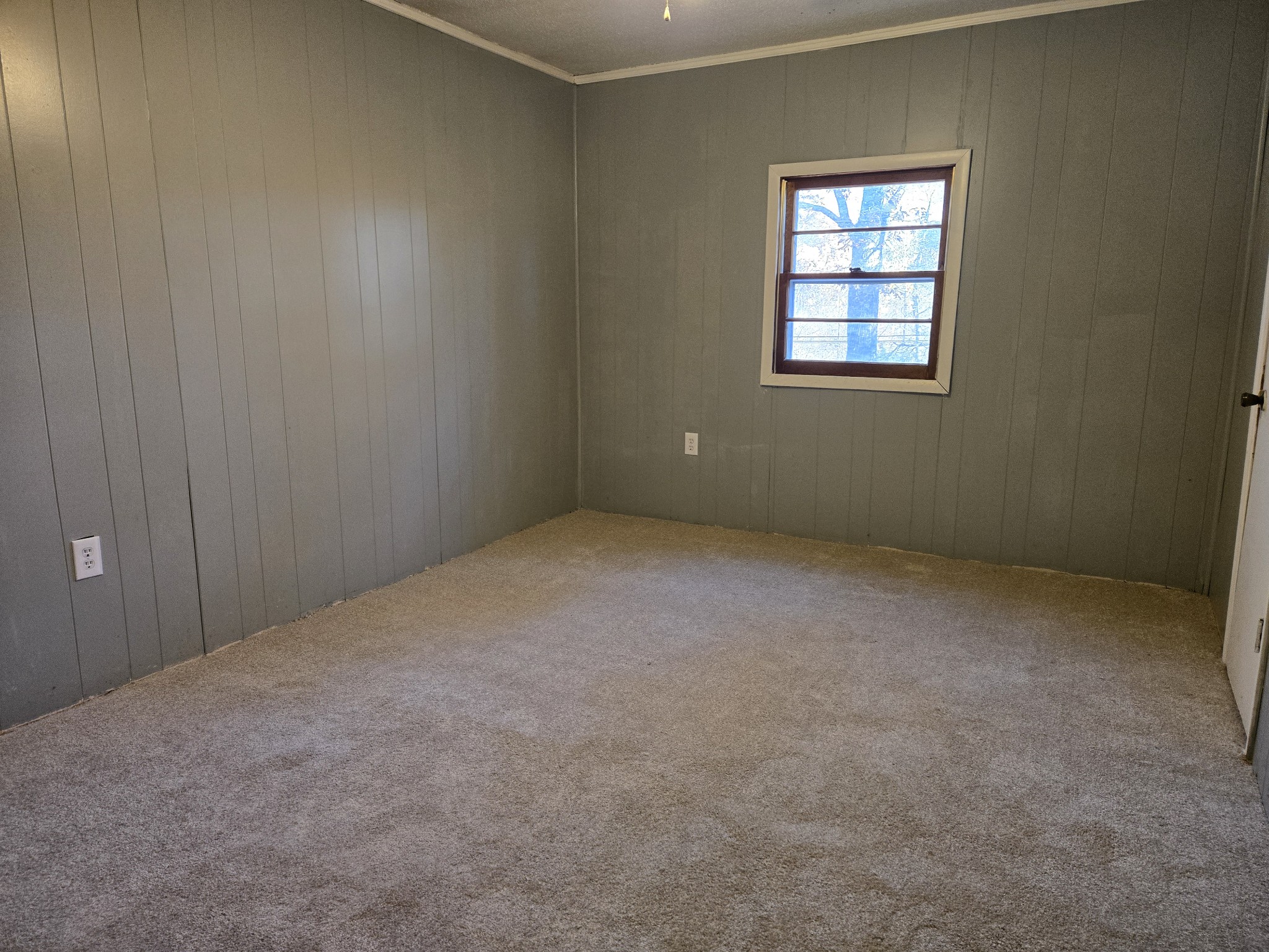 75 Travis Street Tracy City, TN 37387 - Photo 27 of 37 an empty room with windows