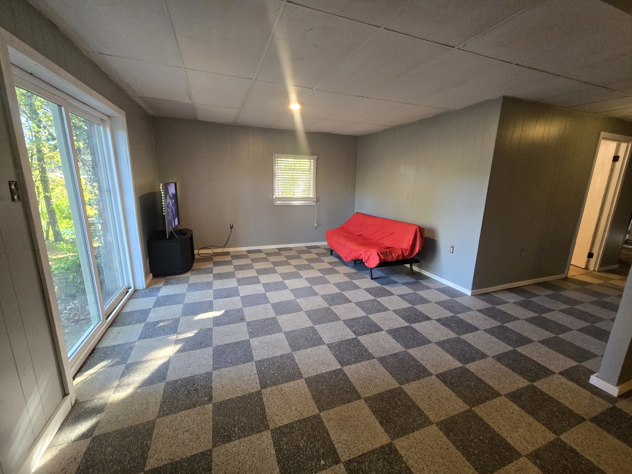 75 Travis Street Tracy City, TN 37387 - Photo 29 of 37 a bedroom with a bed and a mirror