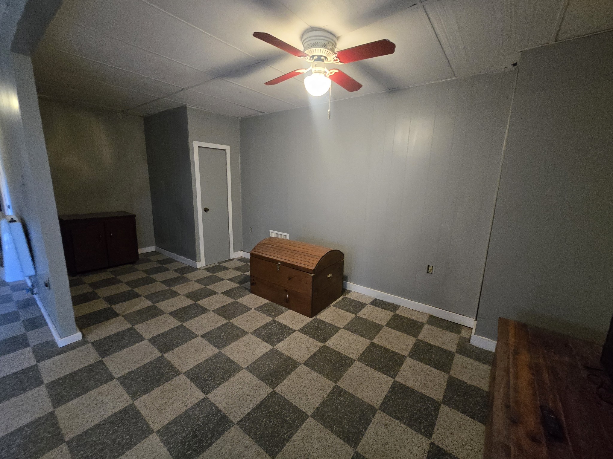 75 Travis Street Tracy City, TN 37387 - Photo 31 of 37 a bedroom with a bed and a mirror