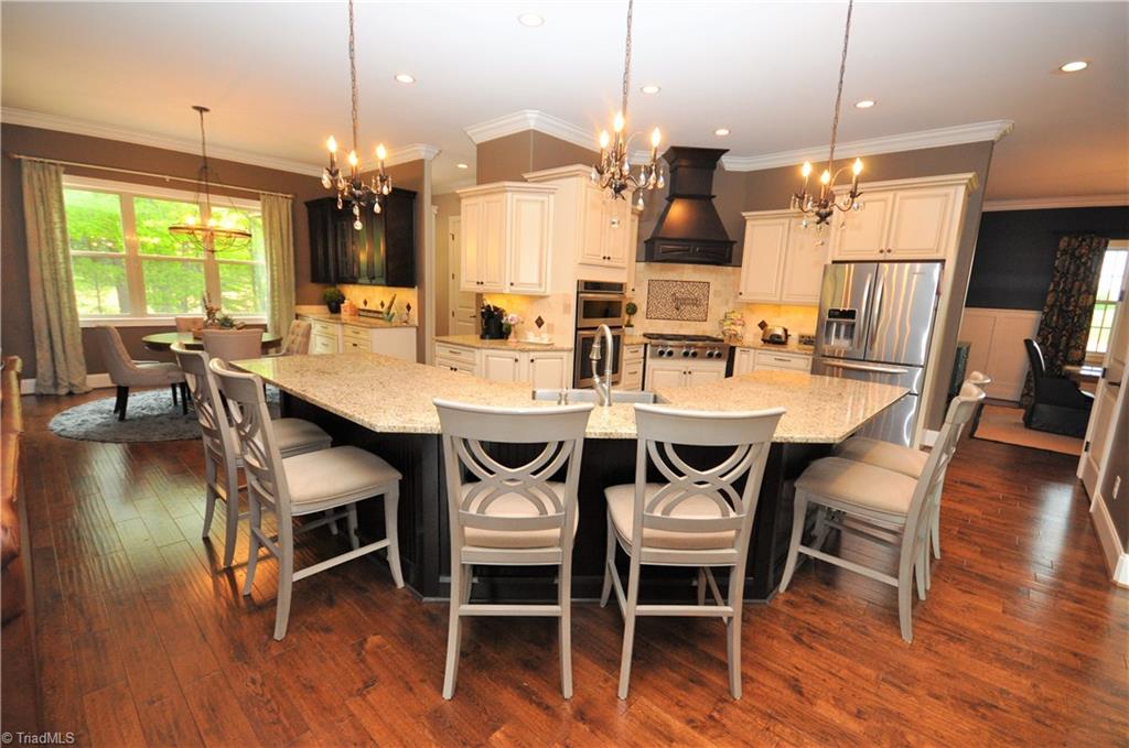 5849 Pepper Road Oak Ridge, NC 27310 - Photo 10 of 28 Expansive island with casual seating