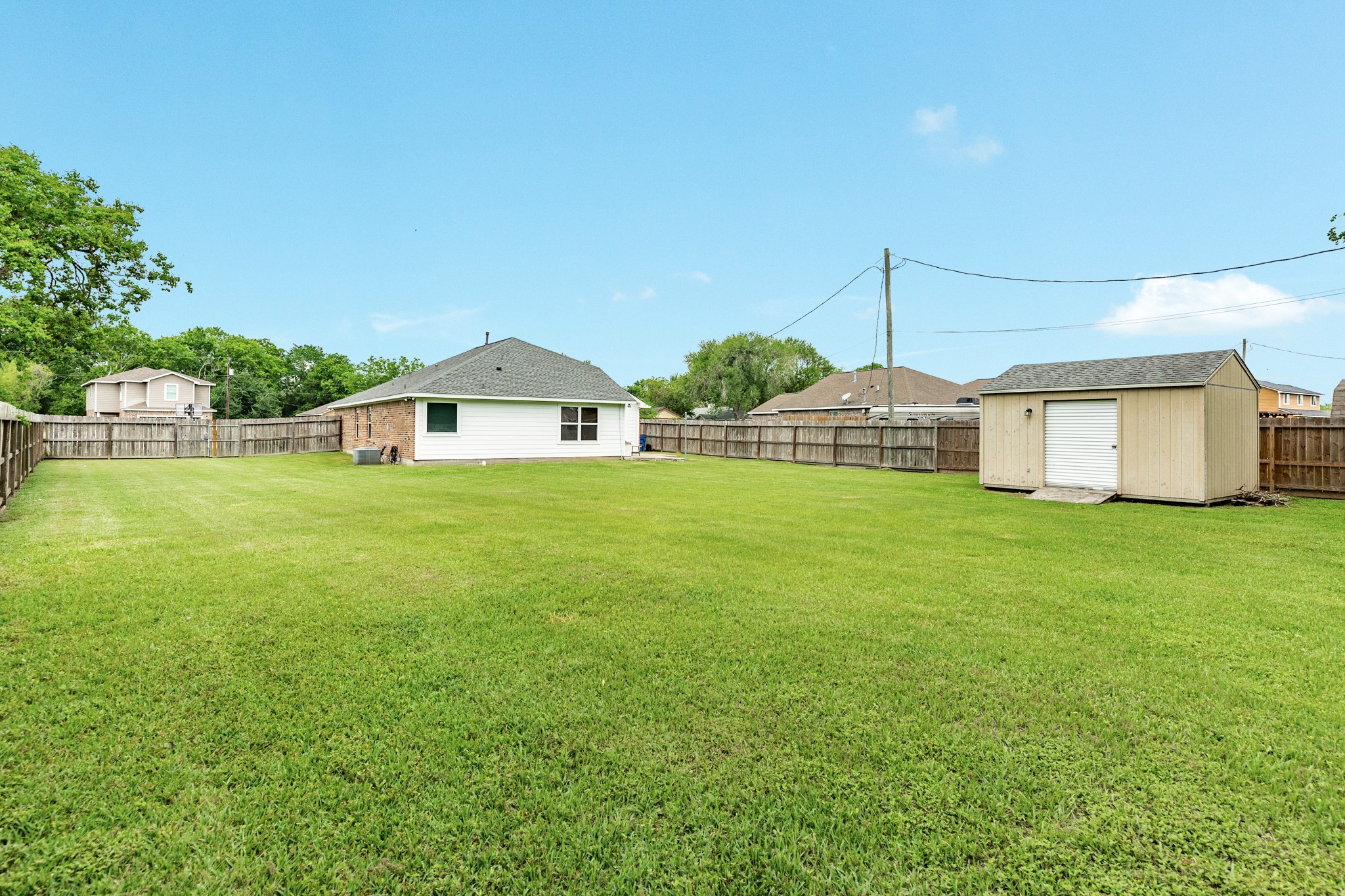 6108 Fox Ridge Drive Angleton, TX 77515 - Photo 24 of 26 a house view with a garden space