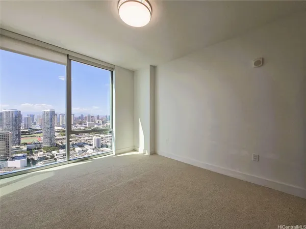 a view of a room next to a window