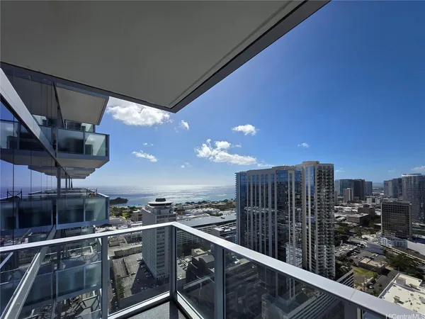a view of a balcony with city view
