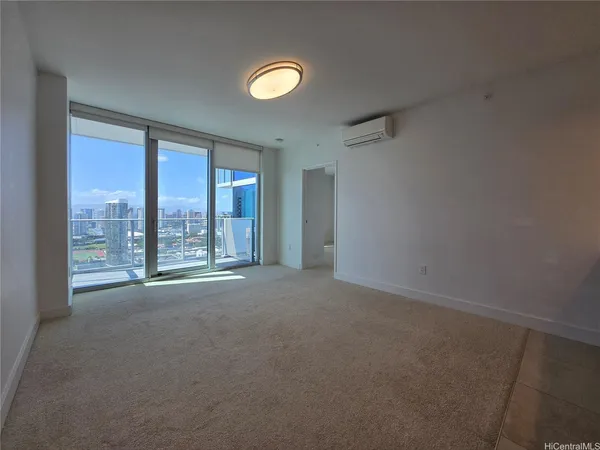 a view of an empty room with a window