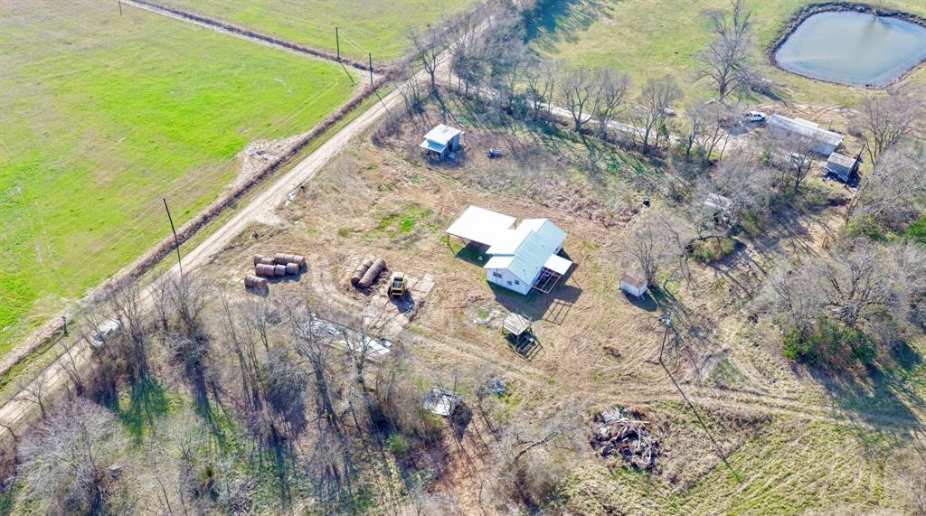 5194 County Road Pattonville, TX 75468 - Photo 11 of 17 a backyard of a house with lots of green space
