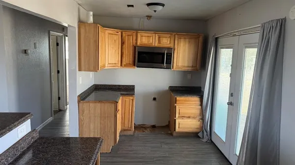 a bathroom with a shower and toilet
