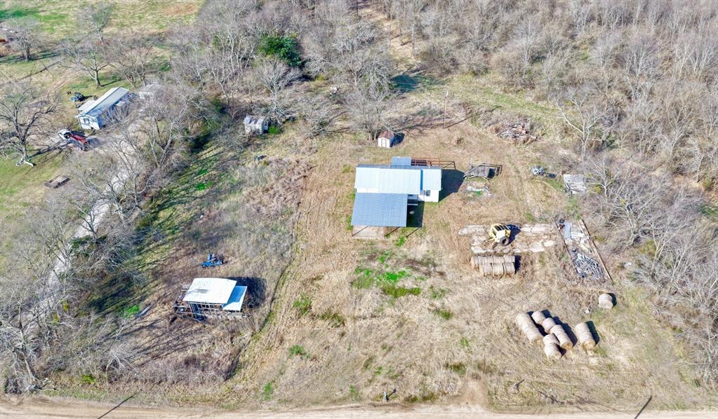 5194 County Road Pattonville, TX 75468 - Photo 5 of 17 an aerial view of a house with a yard