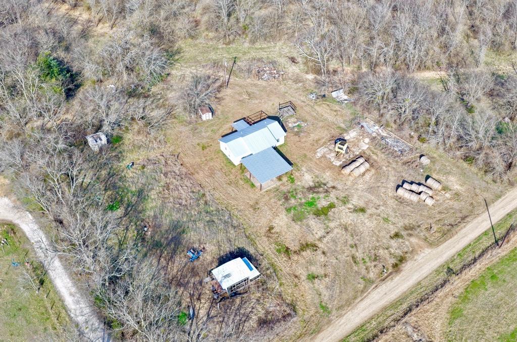 5194 County Road Pattonville, TX 75468 - Photo 6 of 17 a aerial view of a house with a yard