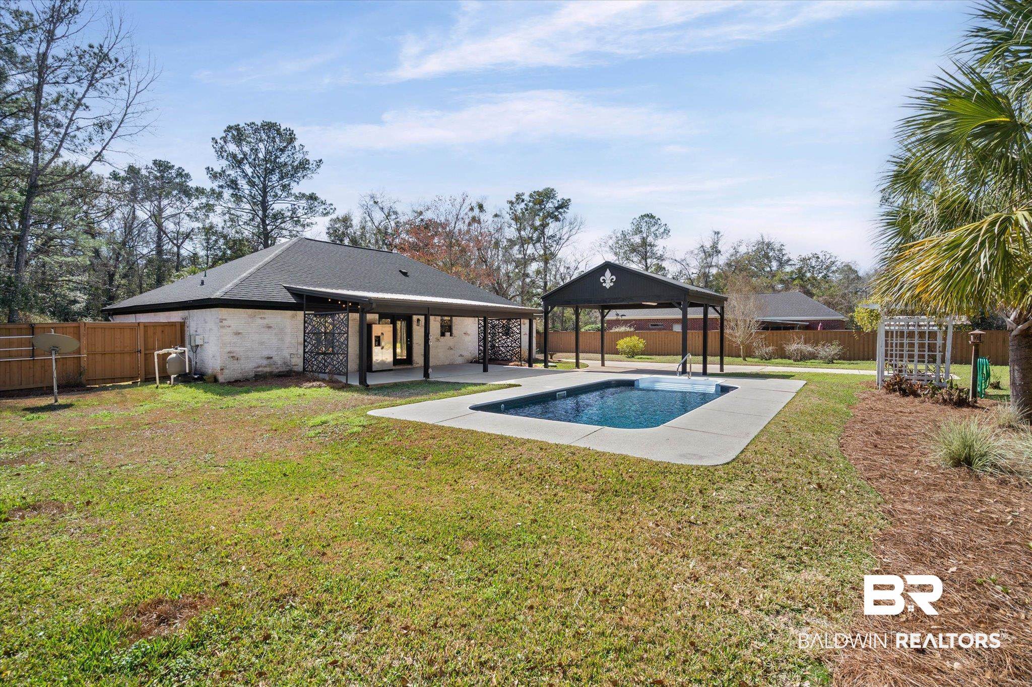 3216 Bay Booster Club Road Theodore, AL 36582 - Photo 25 of 46 Rear view of property with a fenced backyard, a patio, and brick siding